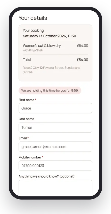 WearBeauty booking form on a phone, entering contact details